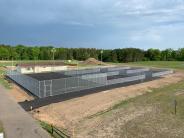 Picture taken from a scissor lift showing the finished fence