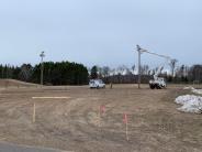 Holden Electric removing a light pole from the project site.