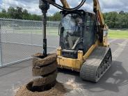 Augering for picnic table footings 